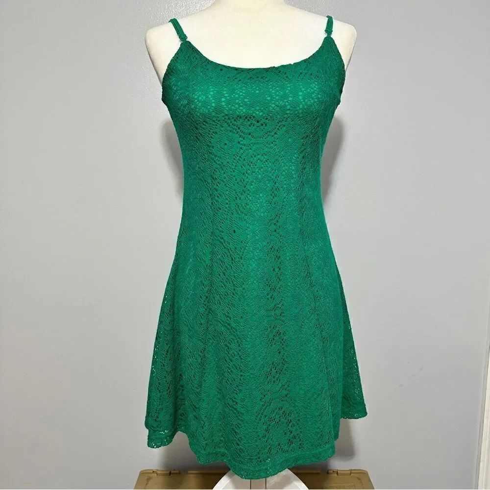 Alya green lace dress with adjustable straps. Size XS